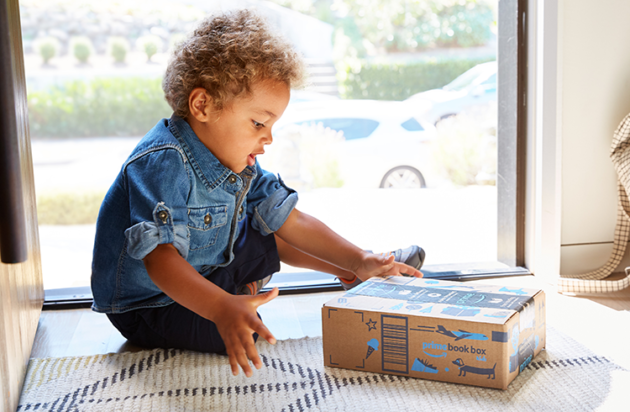 Child opening an Amazon box